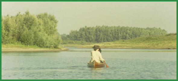 Canadian canoe Soshone rearview sailing